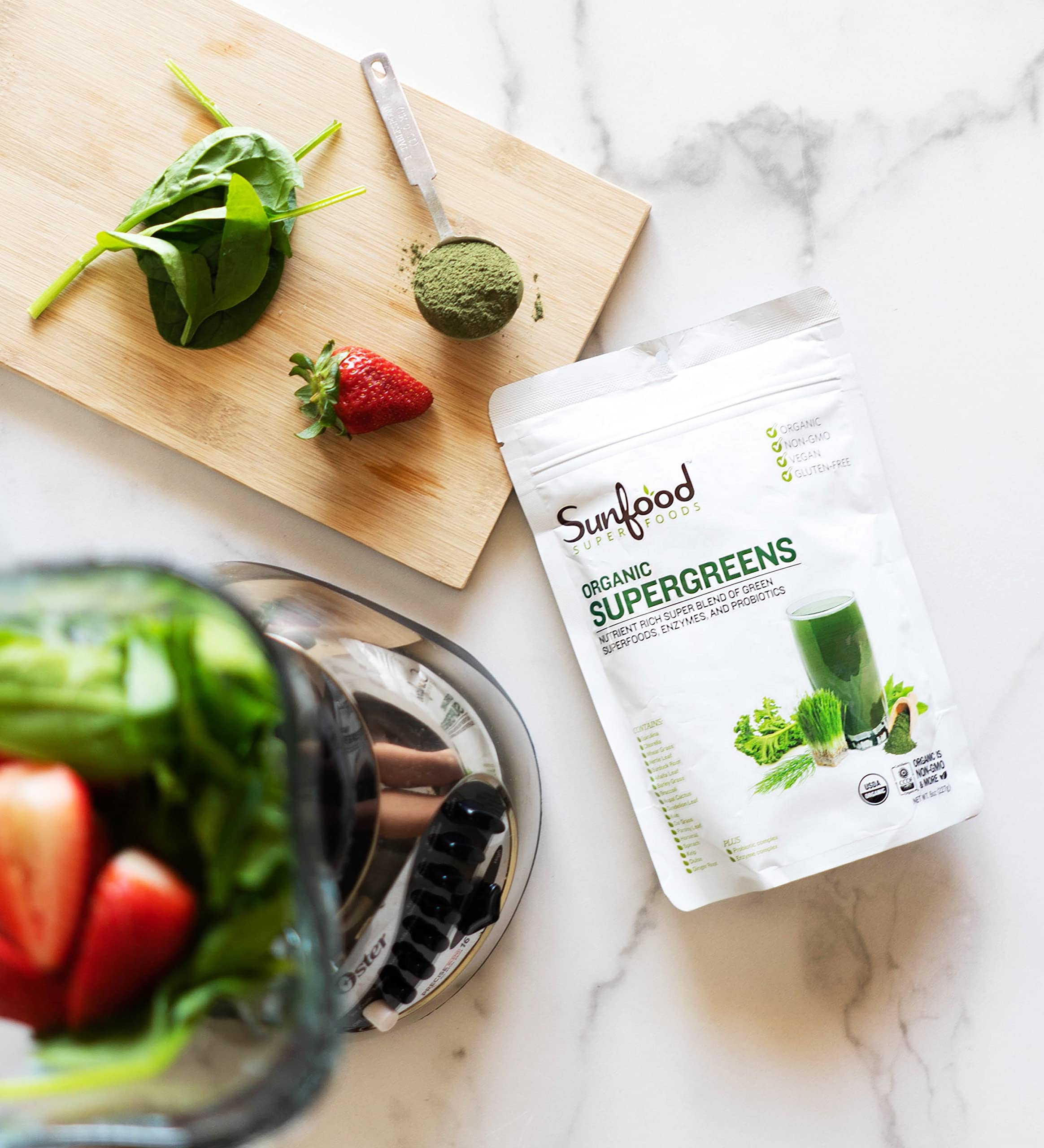 Mixing Sunfood Supergreens powder into water