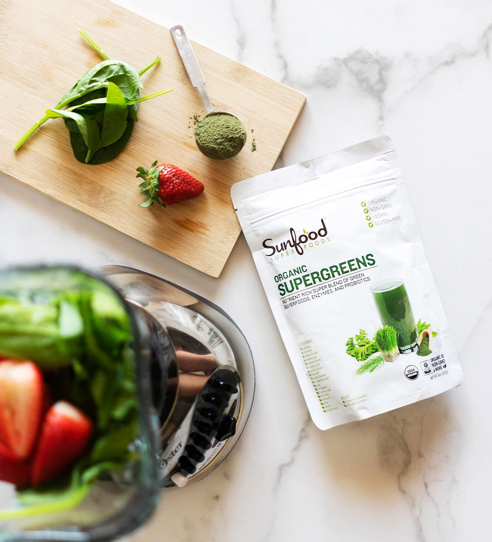 Mixing Sunfood Supergreens powder into water