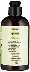Lifestyle shot of Sunny Isle massage oil with spa items