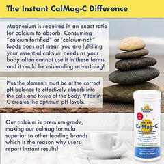 Serving scoop mixing CalMag-C powder into a drink