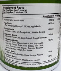 Serving scoop of Super Omega Greens powder in water