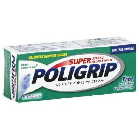Close-up of Super Poligrip 0.75 oz denture adhesive travel tube