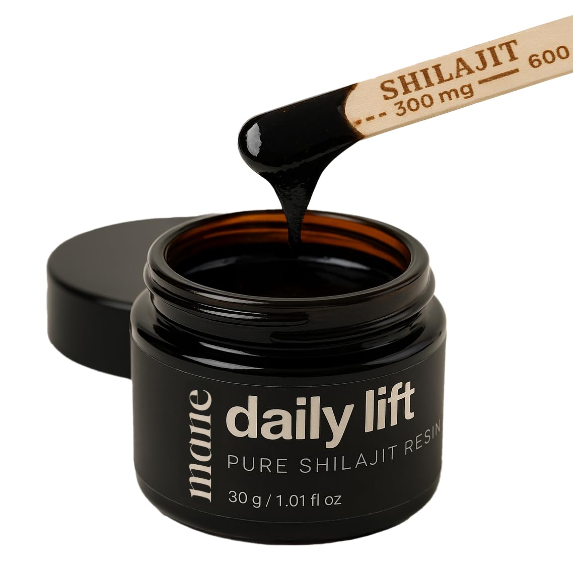 Hero image: Superior Mane Daily Lift Shilajit Resin bottle with scoop on wooden background