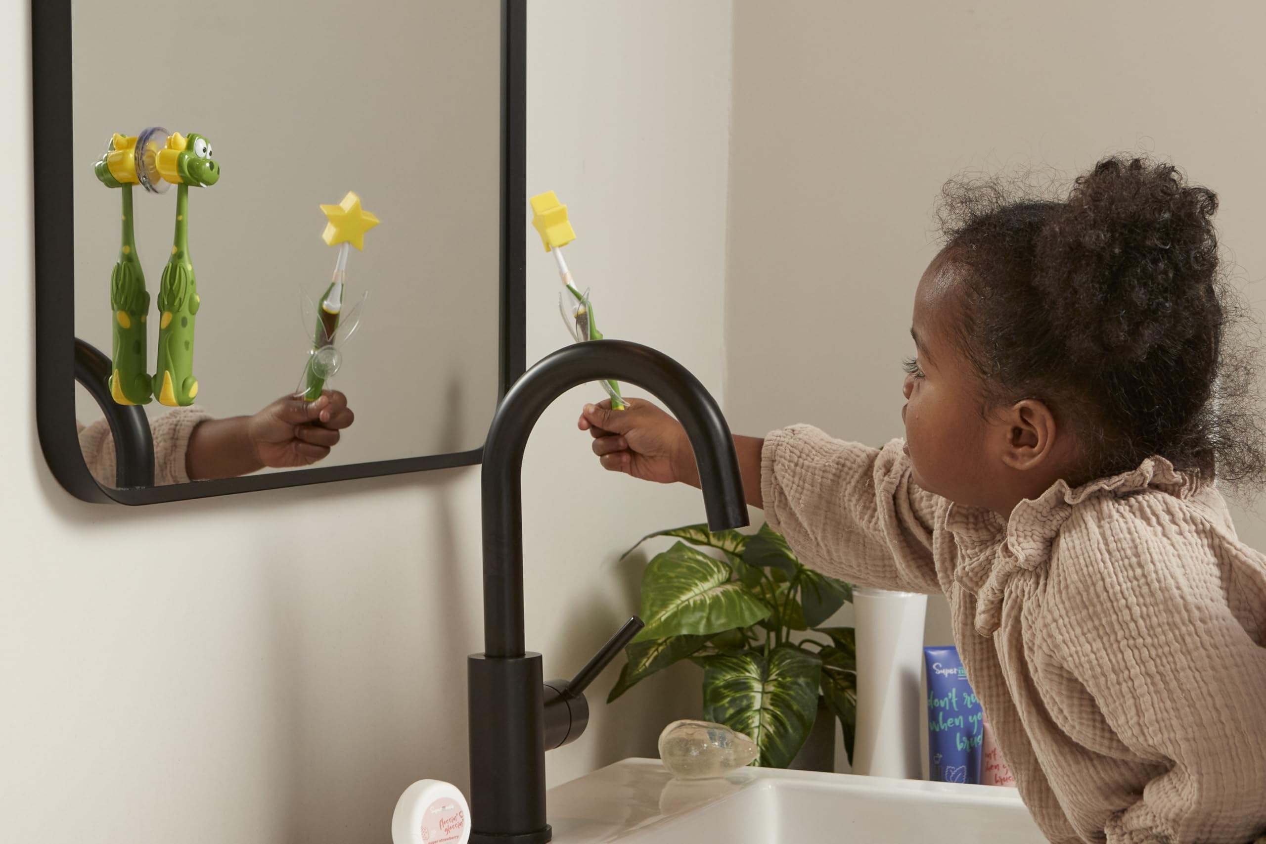Hygienic suction cup stand keeps toothbrush upright