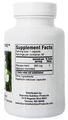Close-up of a vegetarian Bacopa capsule by Supreme Nutrition Products highlighting purity
