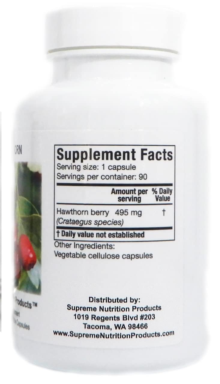 Supreme Nutrition capsules in palm showing serving size and travel-friendly scale