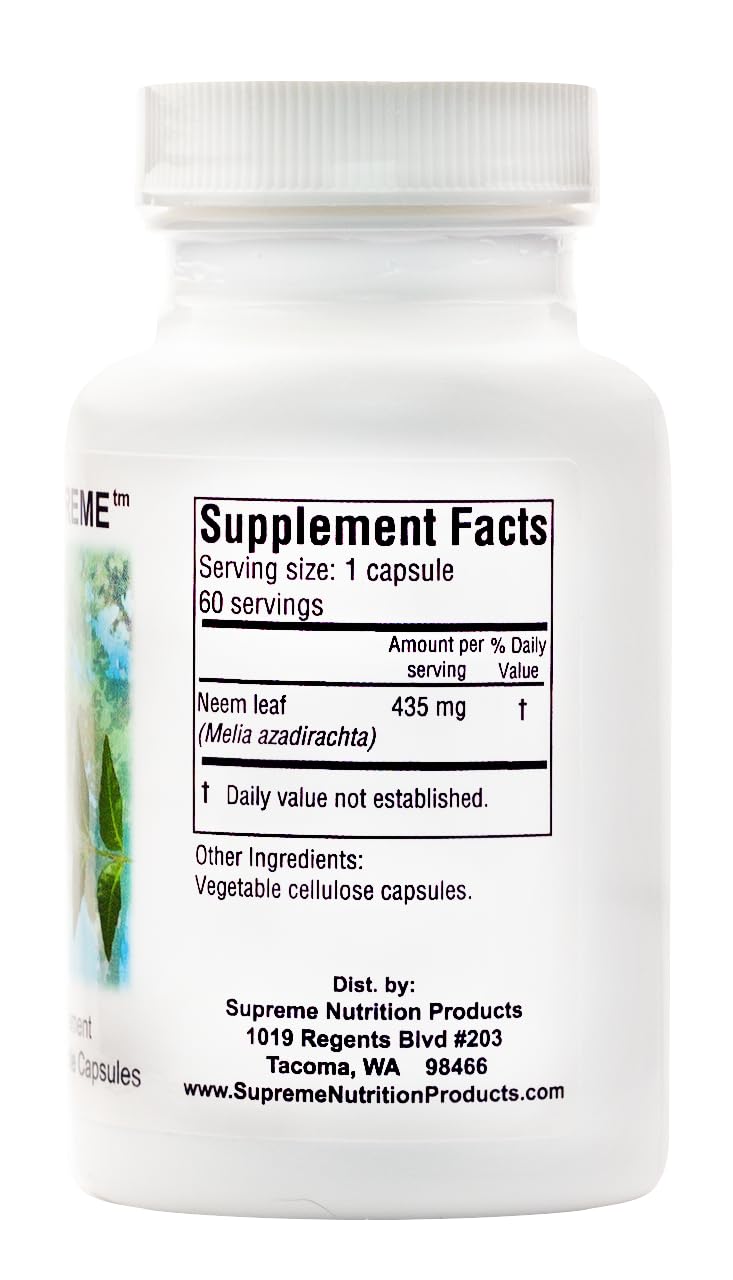 Spoon of powdered neem leaf from Supreme Nutrition demonstrating texture and dose