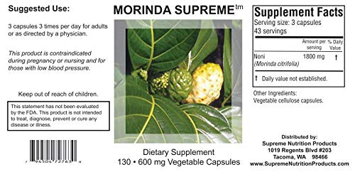 Close-up of a single Morinda Supreme capsule illustrating pure noni powder and easy swallowing benefit