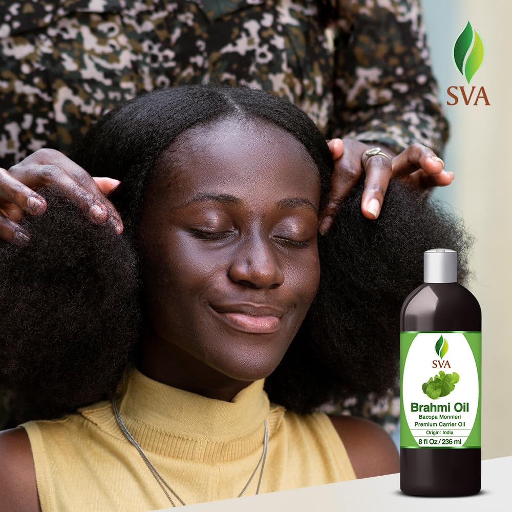 Hair scalp being treated with Brahmi oil