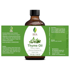 Close-up of thyme essential oil being dispensed from a dropper