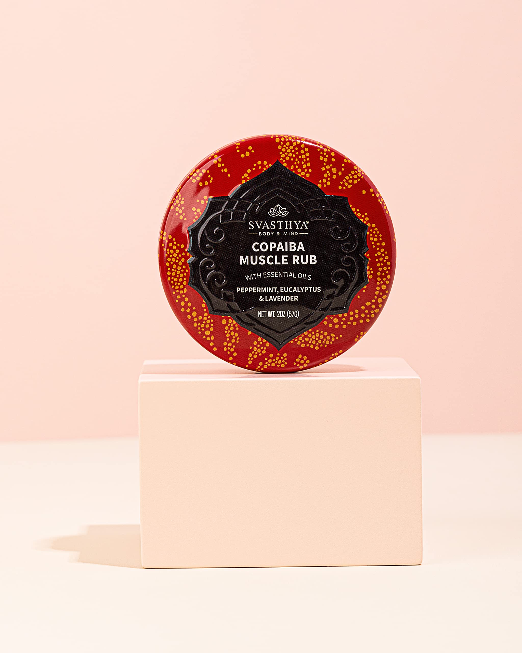 Ingredients include copaiba essential oils and coconut oil