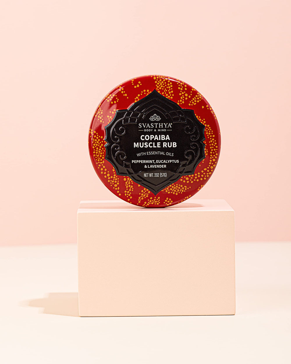 Ingredients include copaiba essential oils and coconut oil