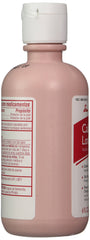 Swan Calamine Lotion side view on bathroom shelf.