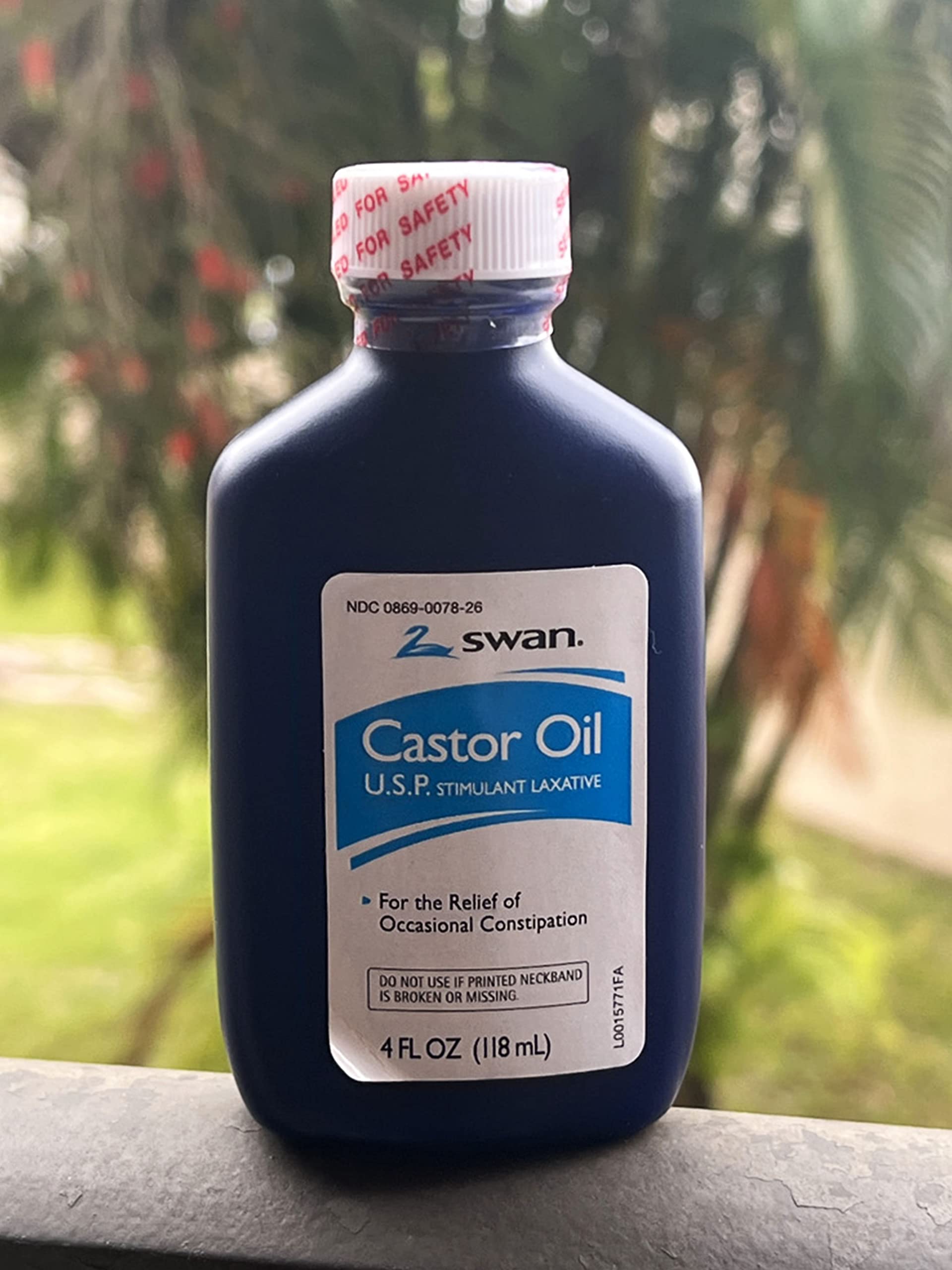 Swan Castor Oil USP container seal ensures secure storage for home use