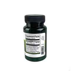 Close-up of hibiscus flower supplement capsules in a natural wellness setting