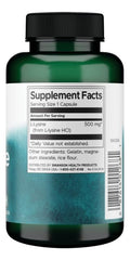 Close-up of Swanson L-Lysine 500 mg capsules and label