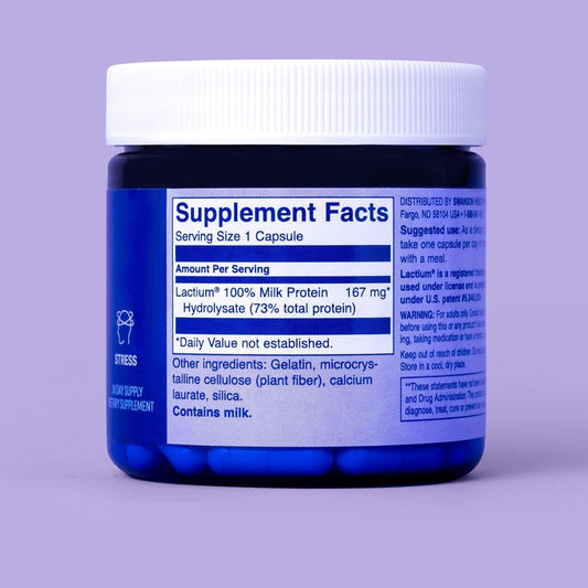 Close-up of Swanson WIO DE-Stress bottle featuring Lactium milk protein peptide and 30 capsules