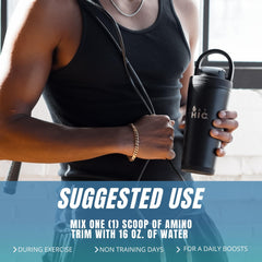 Scooping Amino Trim into water for pre-workout use