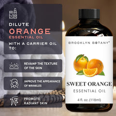Sweet Orange Essential Oil bottle beside orange slices