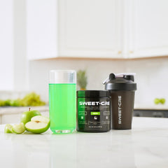 Measuring scoop of Fruit Punch flavored creatine monohydrate being poured