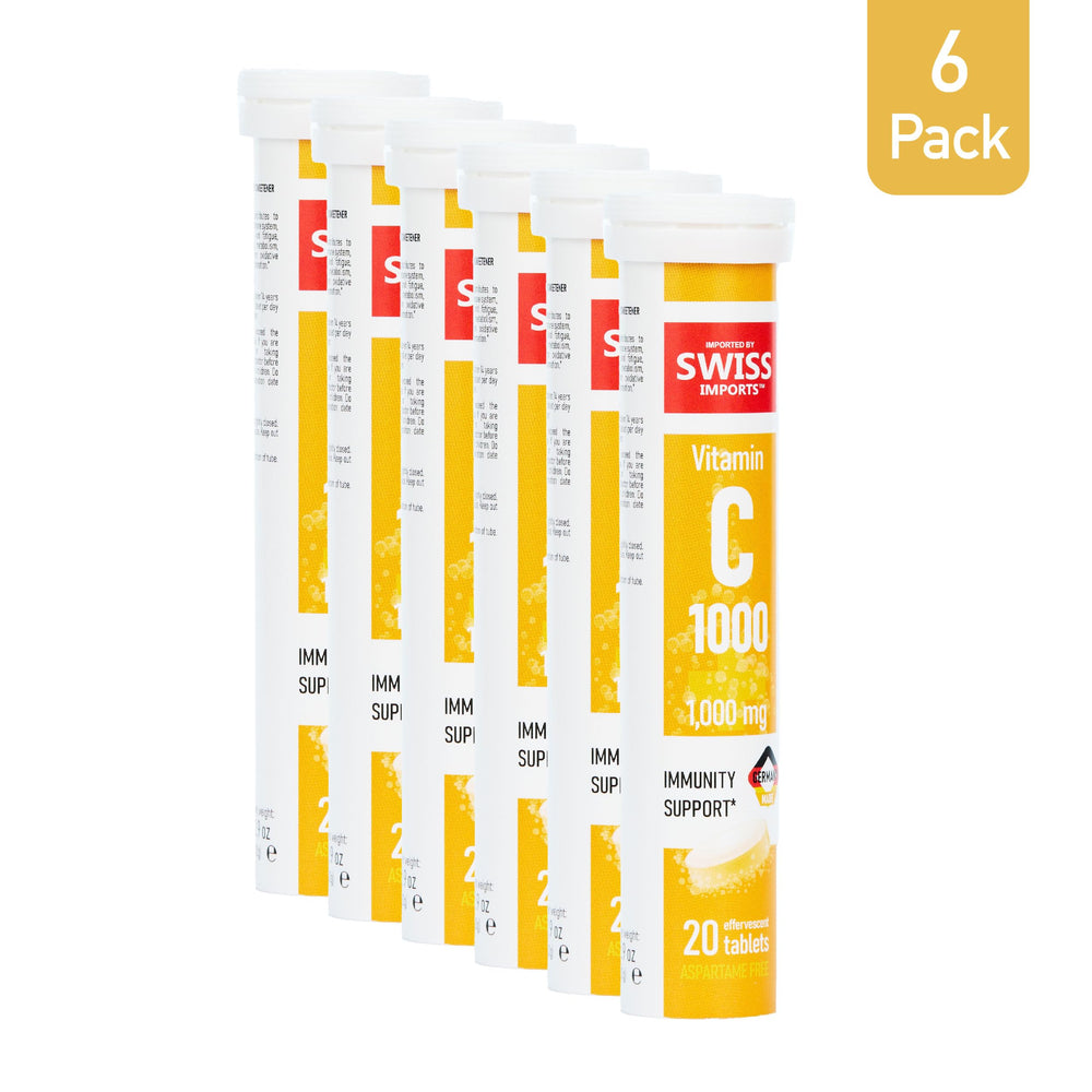 Orange-flavored Vitamin C effervescent tablet dissolving in water