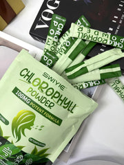 Chlorophyll powder on a green background