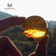 Product packaging featuring SZ Essentials branding on a dark background