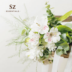 Natural perfumery blending jasmine absolute into perfume base