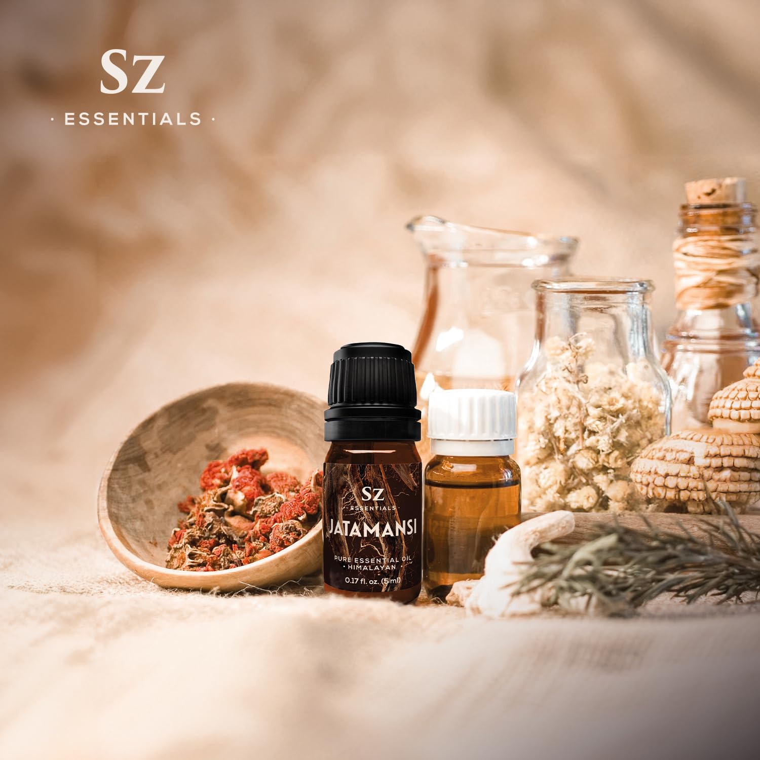 Sz Essentials branding on oil bottle label