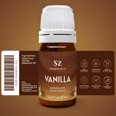 Fresh vanilla pods beside Sz Essentials Vanilla Essential Oil bottle