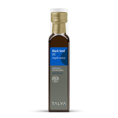 Tinted glass bottle protecting oil from light