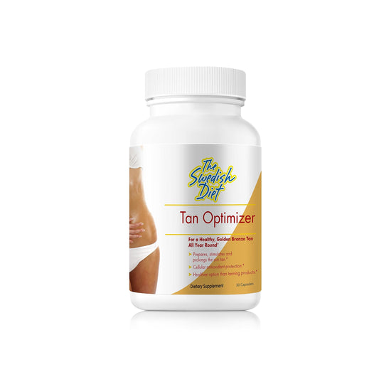 Close-up of Tan Optimizer capsules containing vitamin A beta carotene