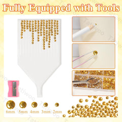Tatiwoo yellow gold flatback rhinestones in 4mm for bold embellishments.