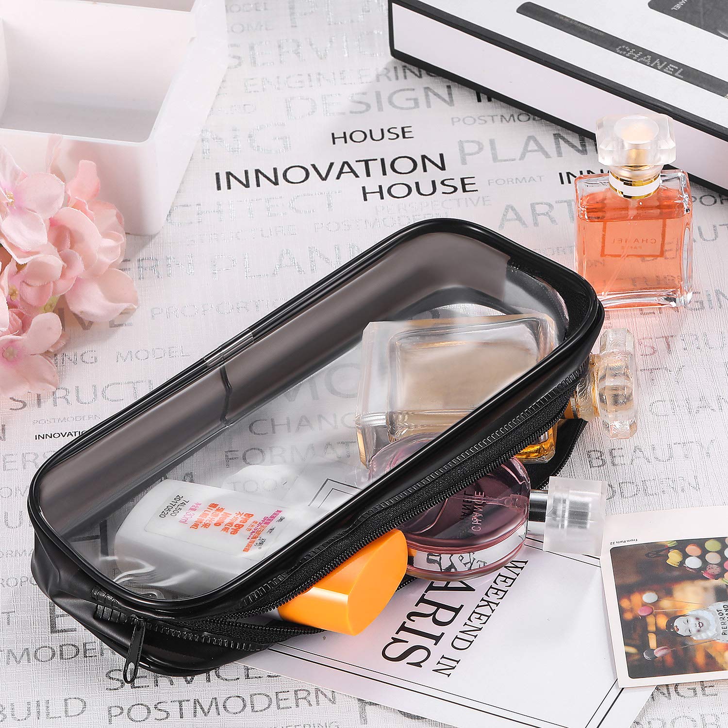 Tatuo luggage-friendly PVC bag ideal for cosmetics and travel essentials.