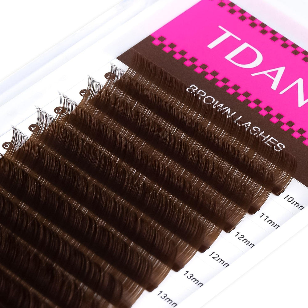 TDANCE brown mega volume lashes close-up demonstrates rich hue and curl.