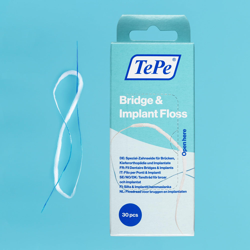 Floss passing around dental implants and braces