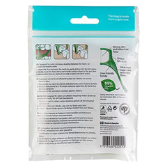 Close-up of TePe Mini Flosser floss between teeth