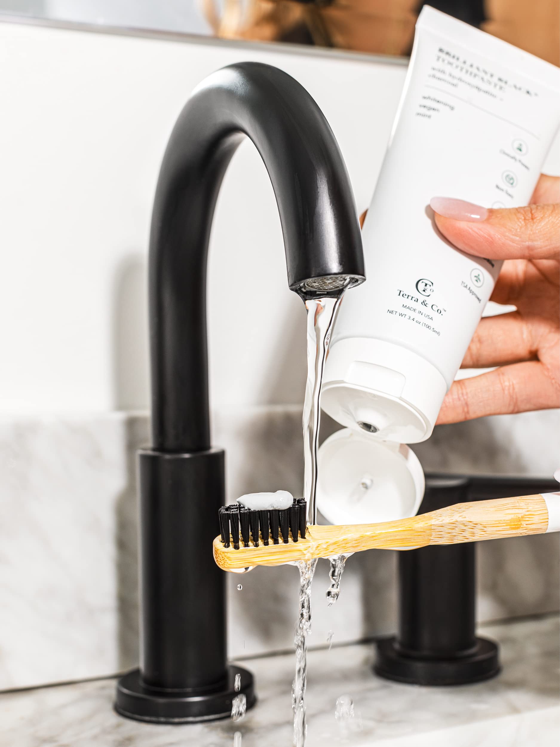 Contrasting black dental floss in use