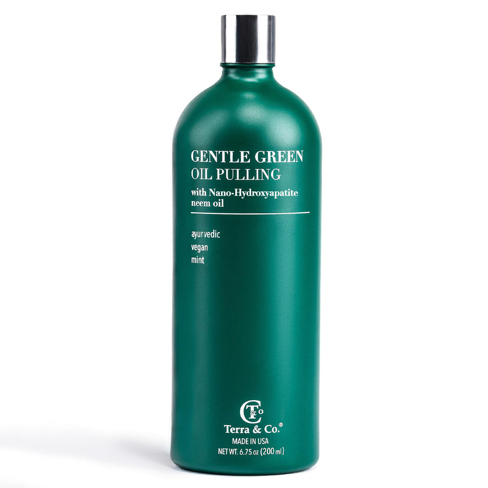 Front view of Terra & Co Nano Hydroxyapatite Gentle Green Oil Pulling bottle