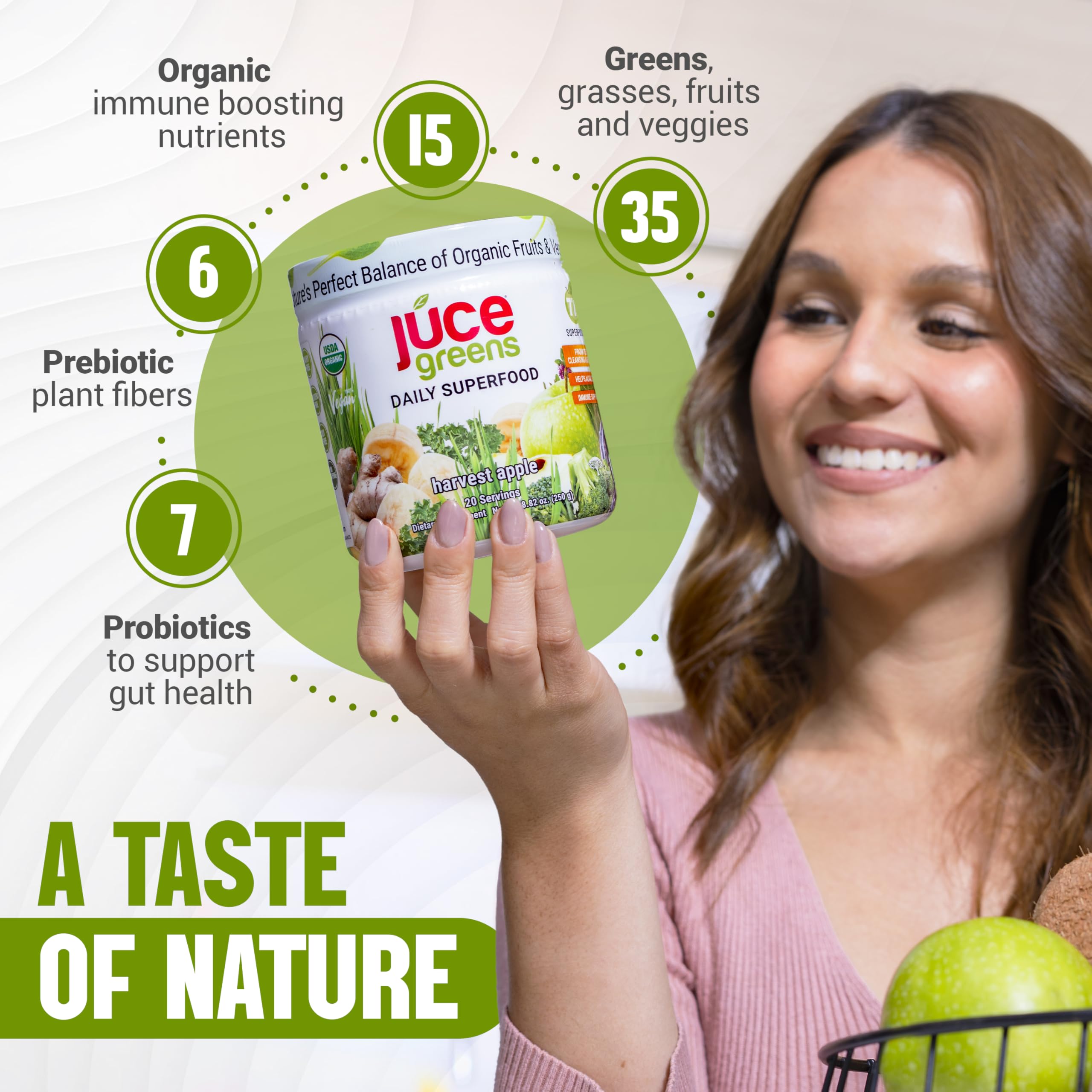 Scoop of JUCE Green Superfood powder with 77 organic superfoods visible