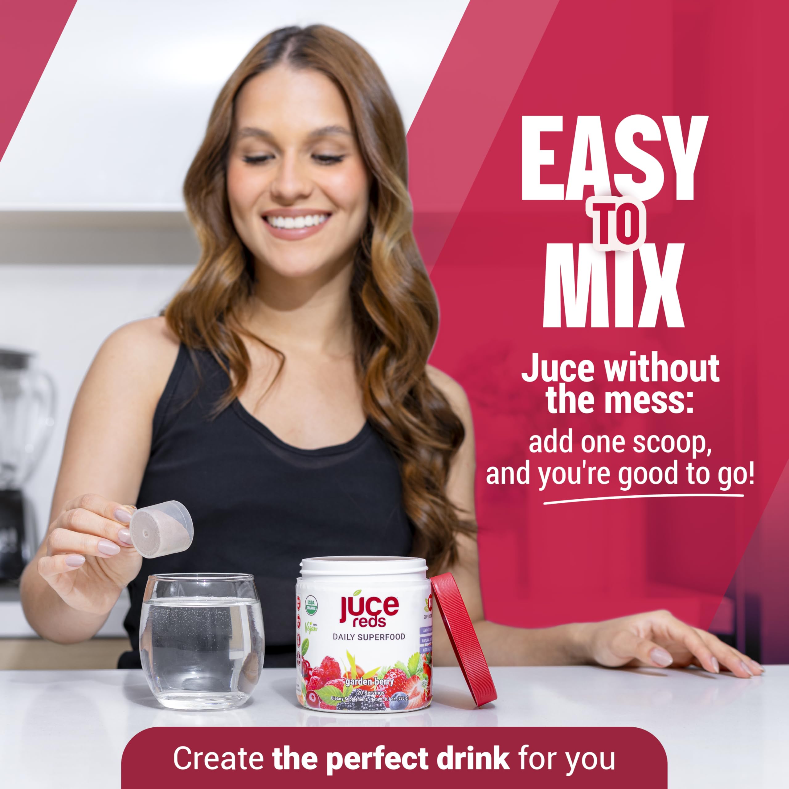 Pouring JUCE Reds into a glass of water