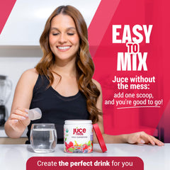 Pouring JUCE Reds into a glass of water