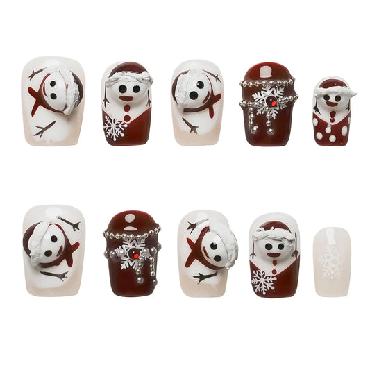Tesytto 3D Snowman nails with burgundy and white snowman design for a chic holiday look.