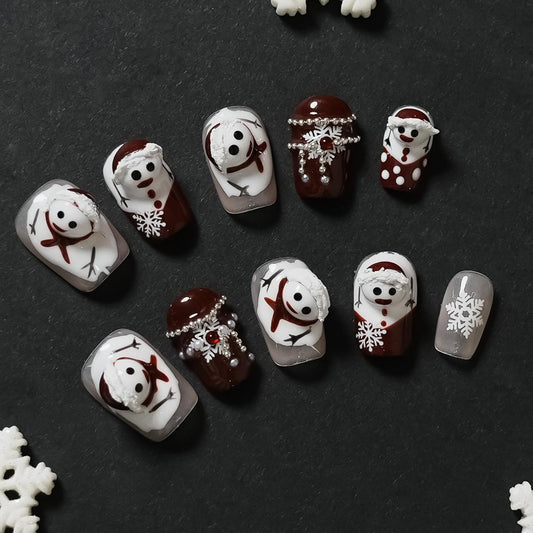 Tesytto 3D Snowman nails in a compact set for winter style and quick wear