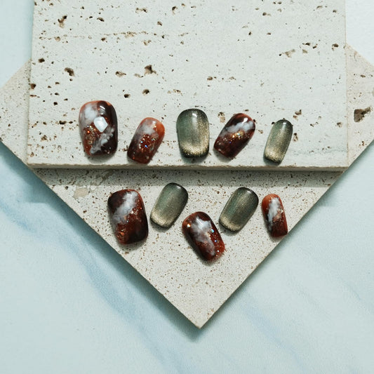 Tesytto amber glitter ombre nails add subtle sparkle for spring events.