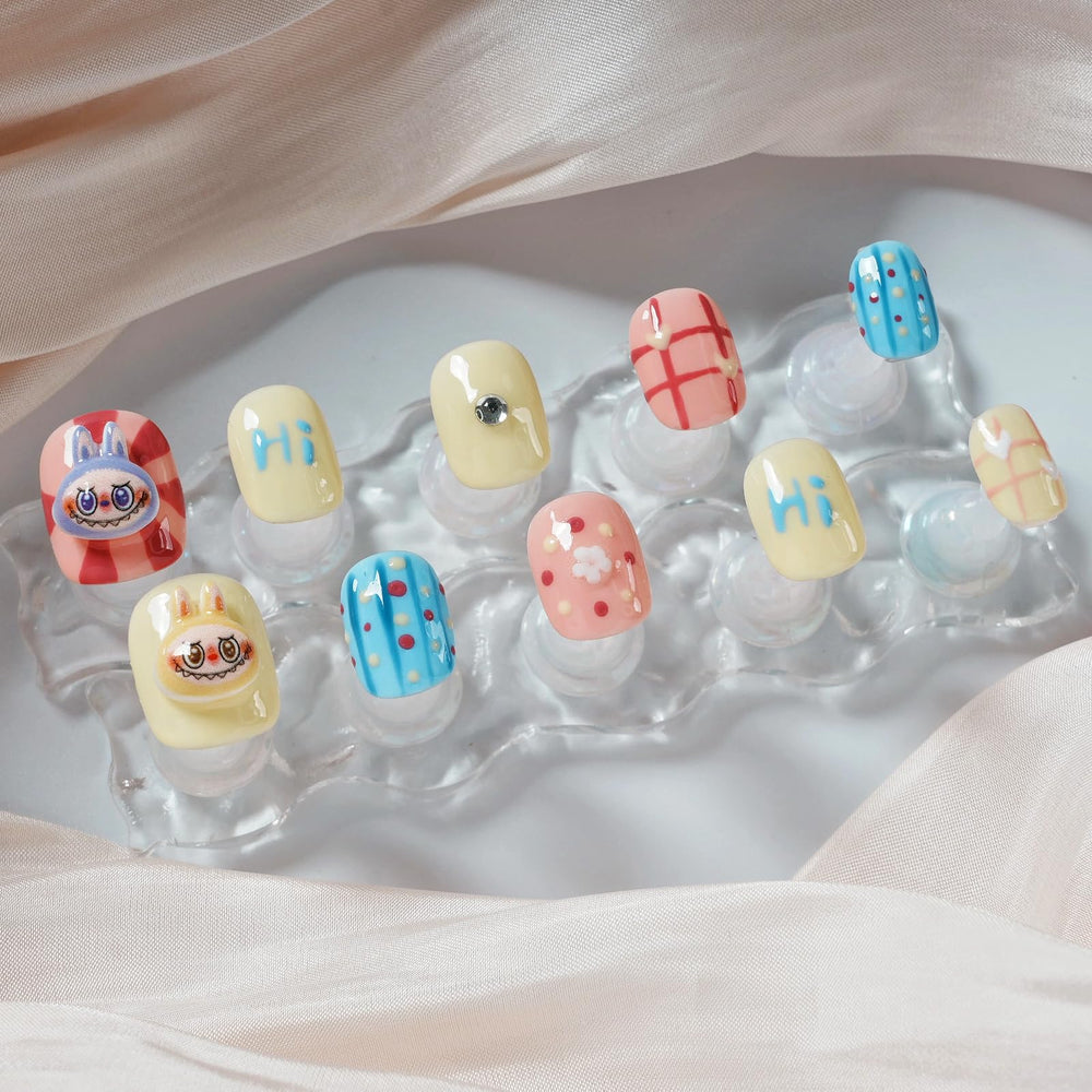 Tesytto durable acrylic construction provides flexible, reusable nails