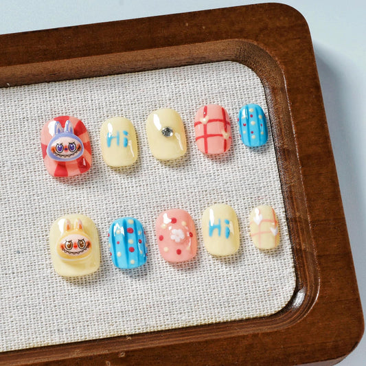 Tesytto pastel polka dot nails for playful daily wear