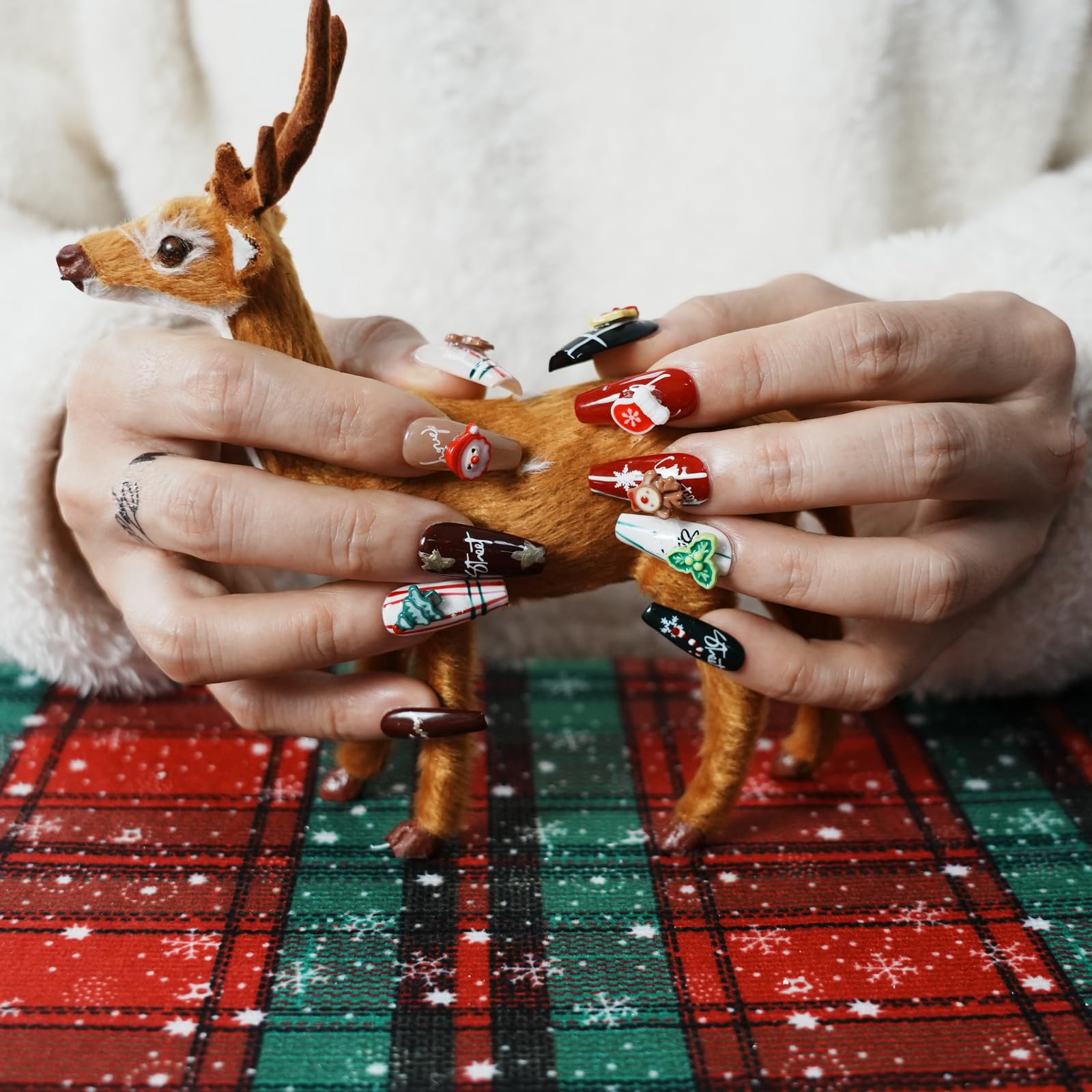 Tesytto nails featuring 3D Christmas trees design for textured holiday style