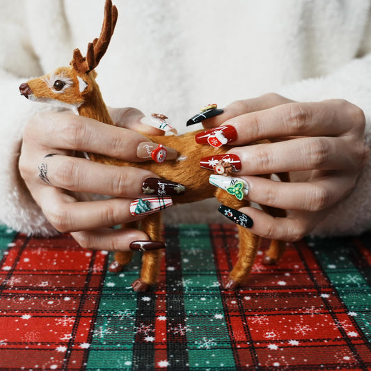 Tesytto nails featuring 3D Christmas trees design for textured holiday style