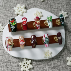 Tesytto nails showcasing gift box design for chic seasonal flair
